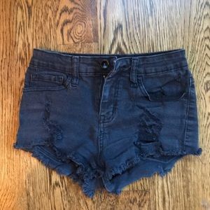 Black shorts brand is klique size xs